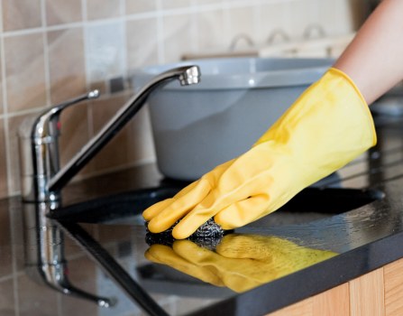 House cleaning essentials arranged for a modern home